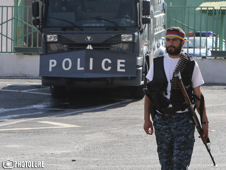 Insurgents surrender leaving police regiment compound in Yerevan