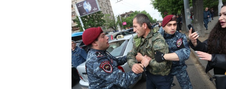 Anti-government protesters scuffle with police in central Yerevan